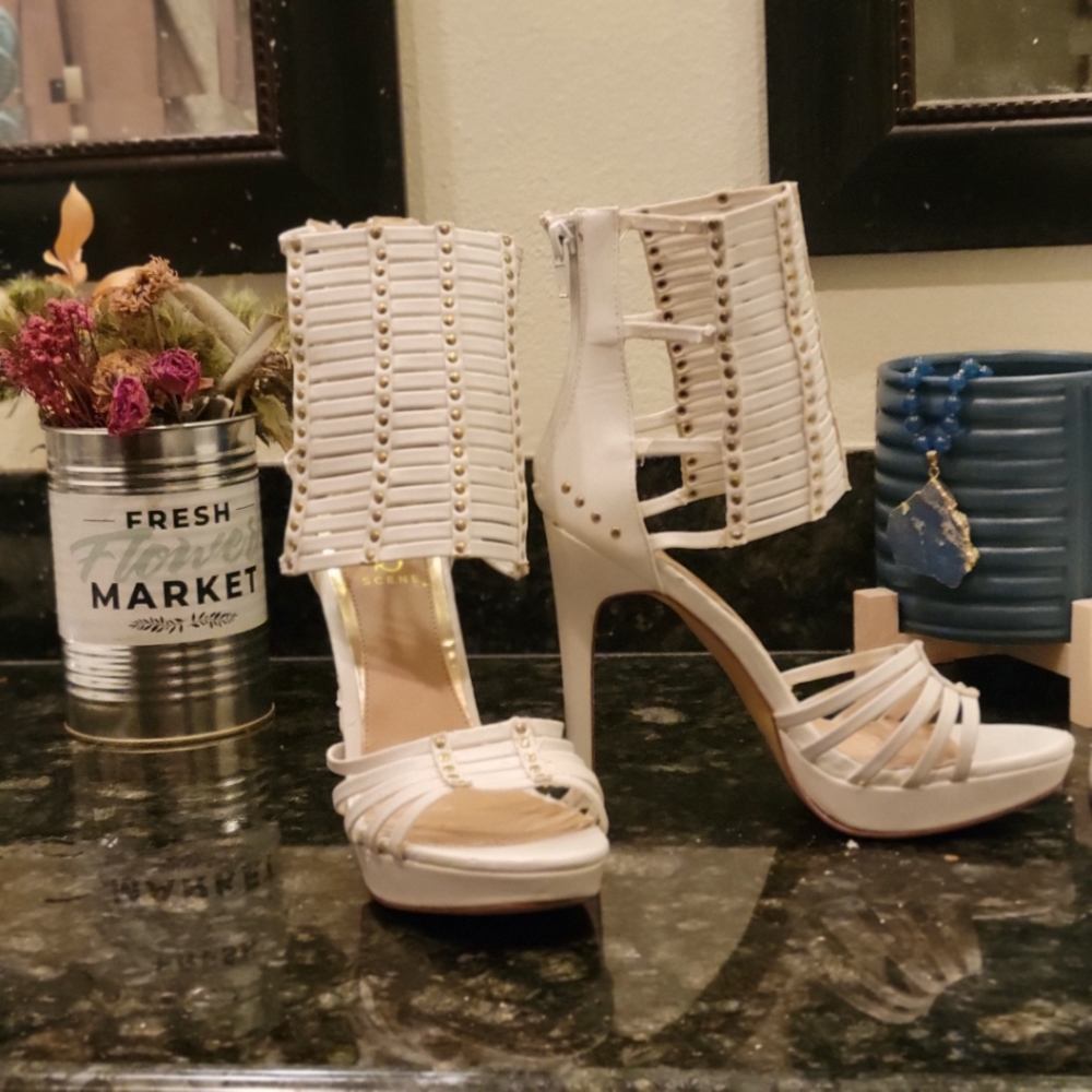 Scene Sanje White Ankle Strap Stilettos.